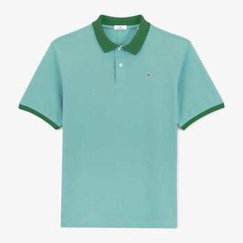 Polo piqué manches courtes en coton bleu glacier col vert sapin