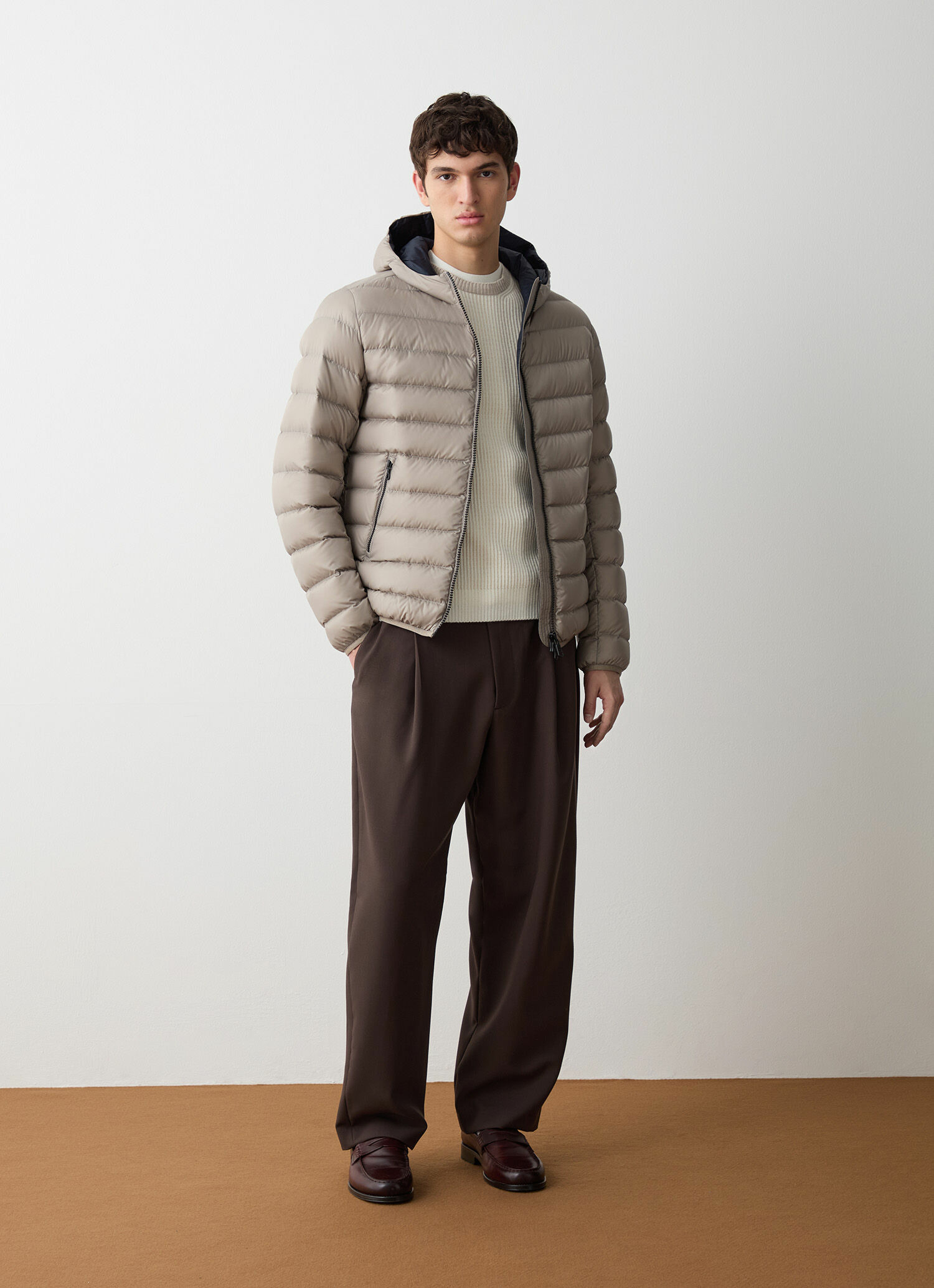 Doudoune sportive avec capuche fixe