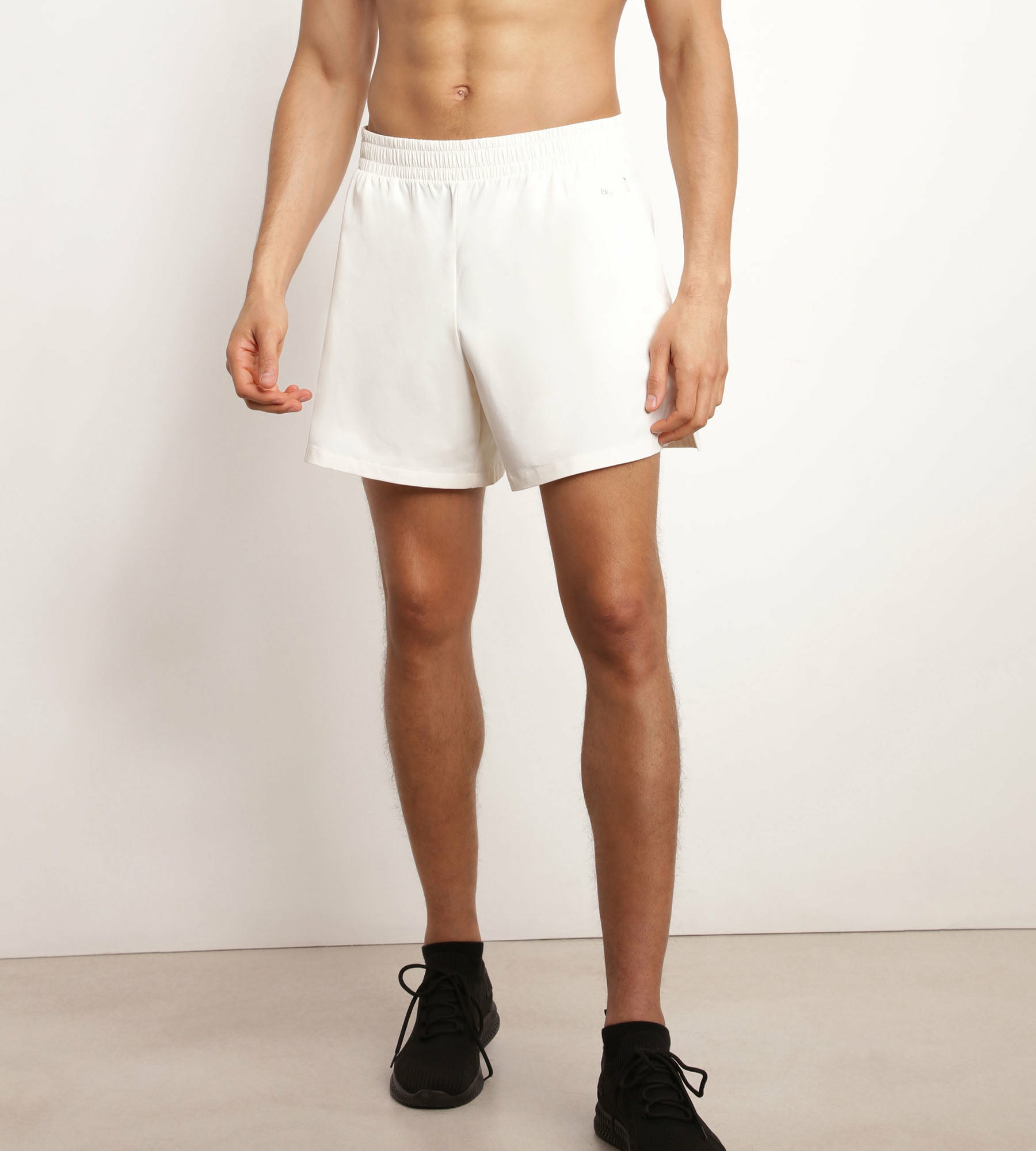 Short de sport homme en matière aérée Écru Dim Move