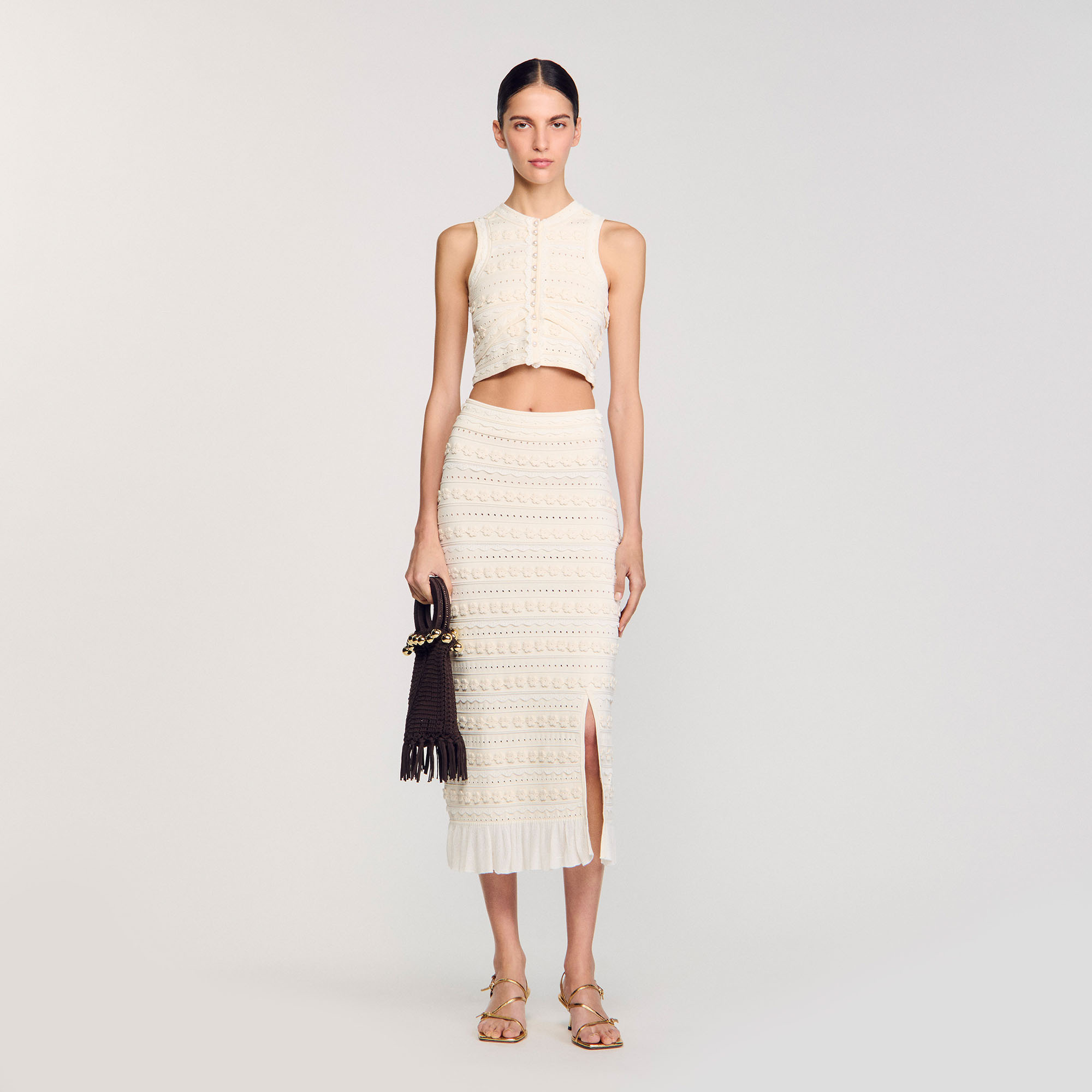 Pull court à détails crochetés