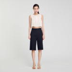 Top court plissé à col strassé