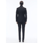 Costume ajusté en laine à plumetis