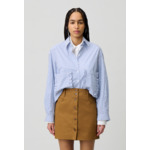 Jupe courte à boutons