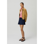 Short contrasté à plis