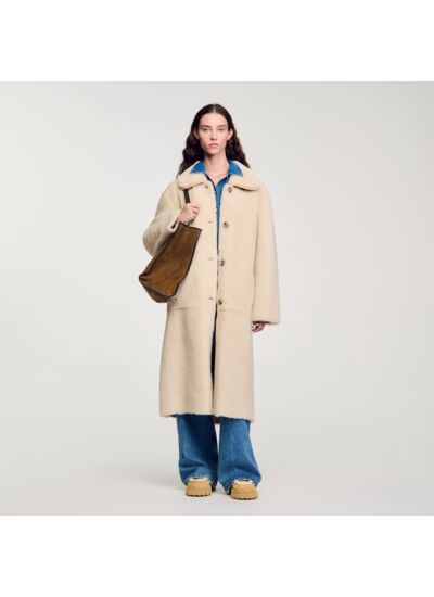 Manteau en peau lainée