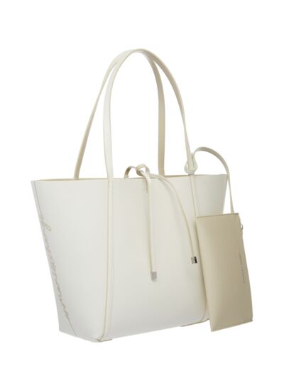 Sac de courses - terrain poussiéreux/journal