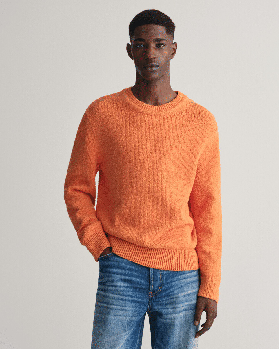 Pull ras du cou en maille bouclée
