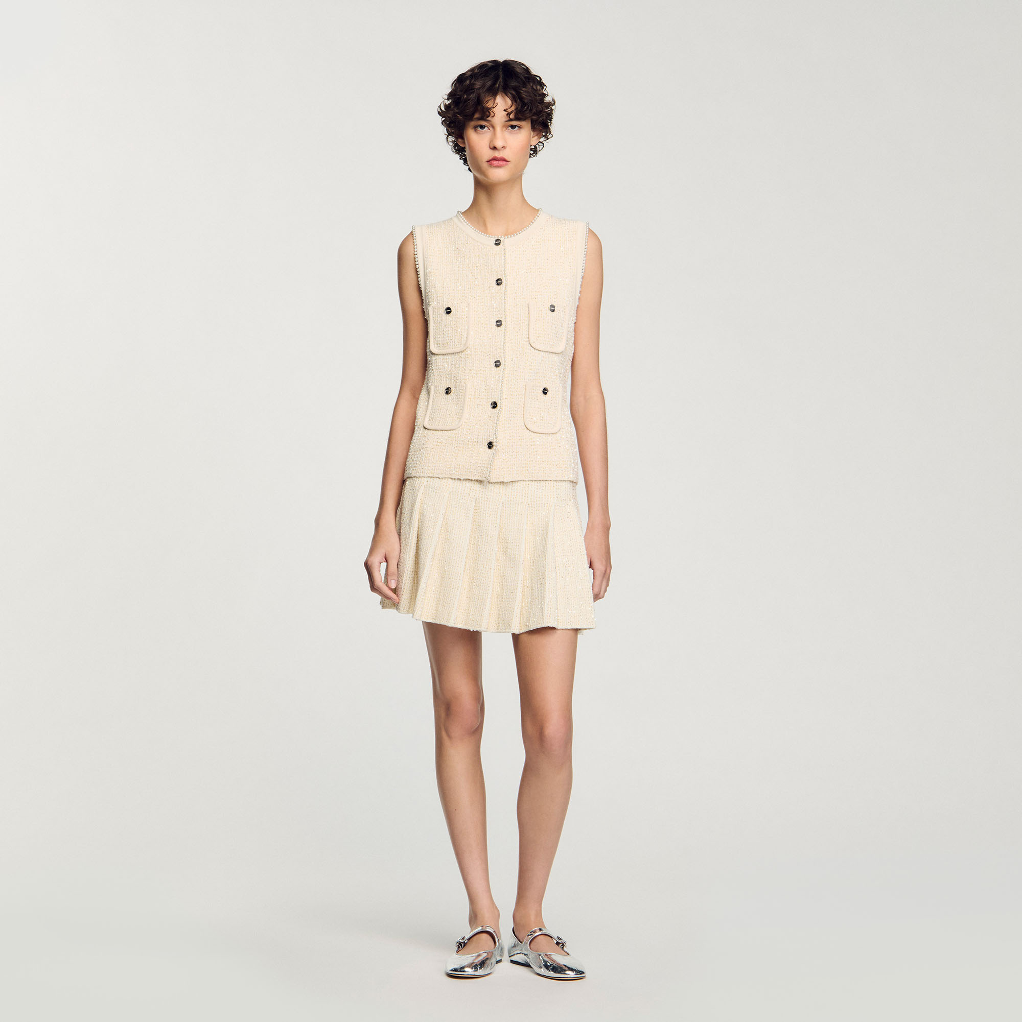 Jupe courte plissée effet tweed