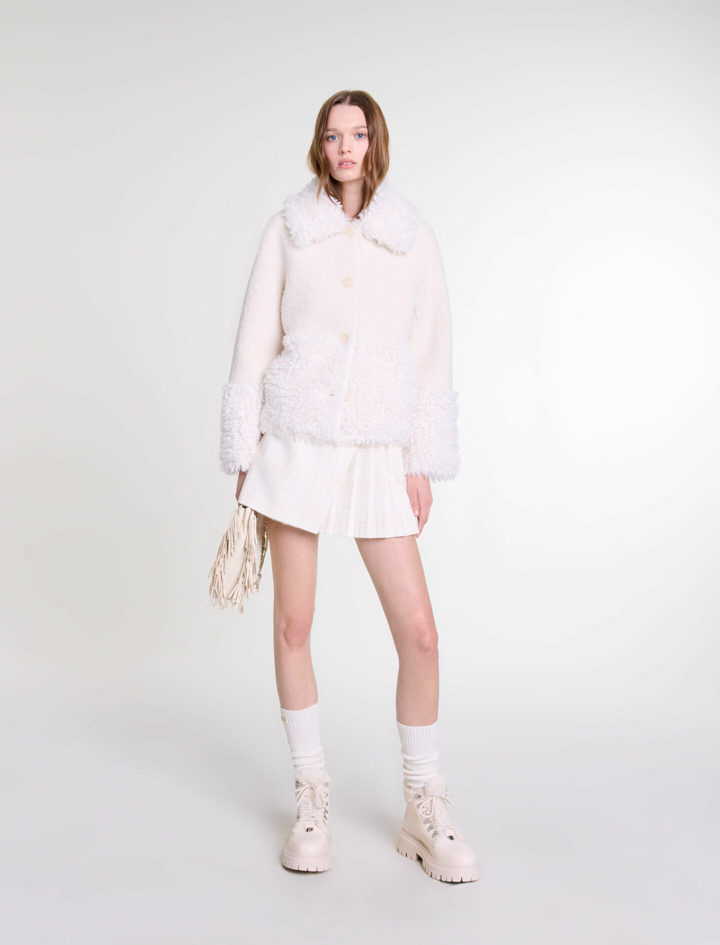 Manteau court fausse fourrure
