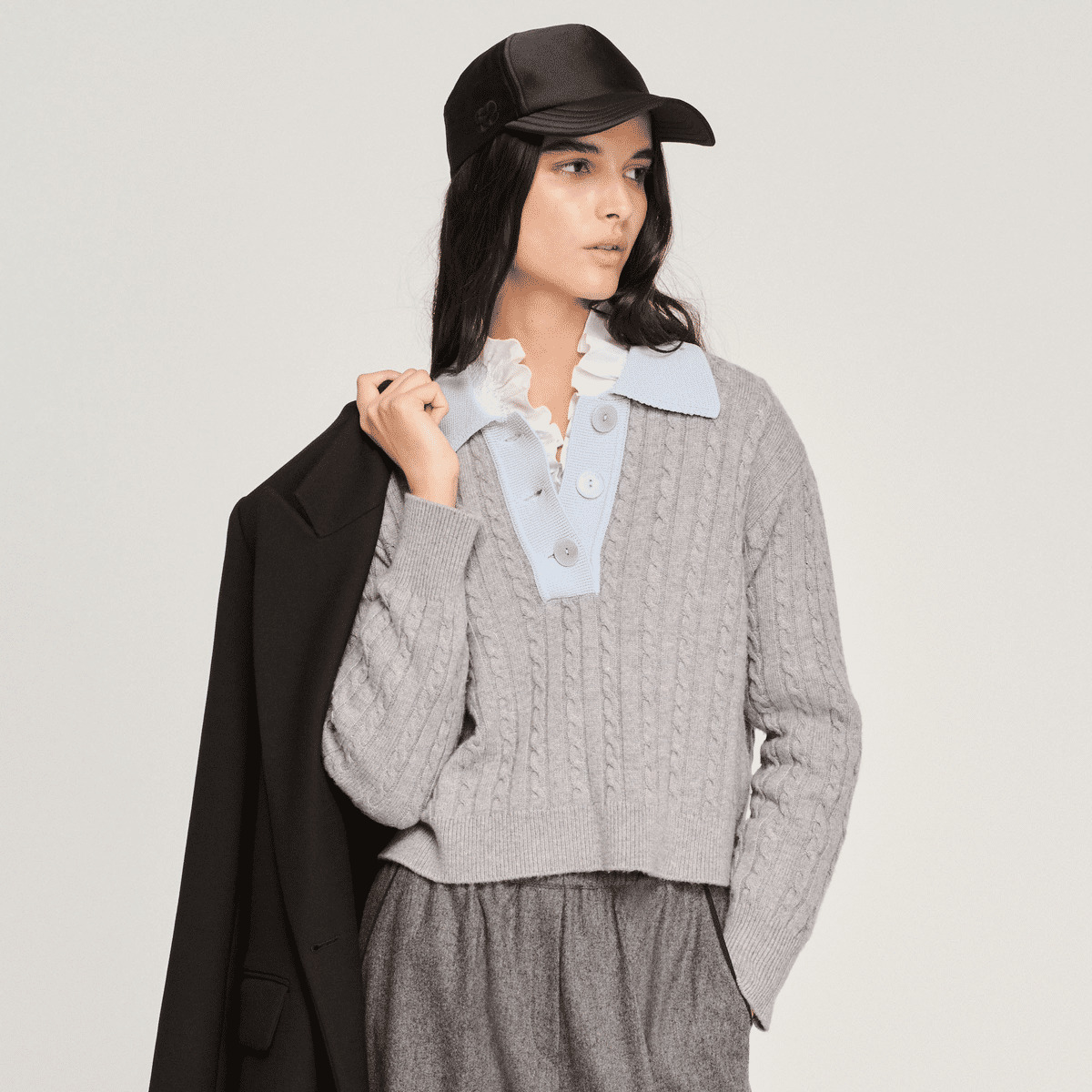 Pull court en maille torsadée
