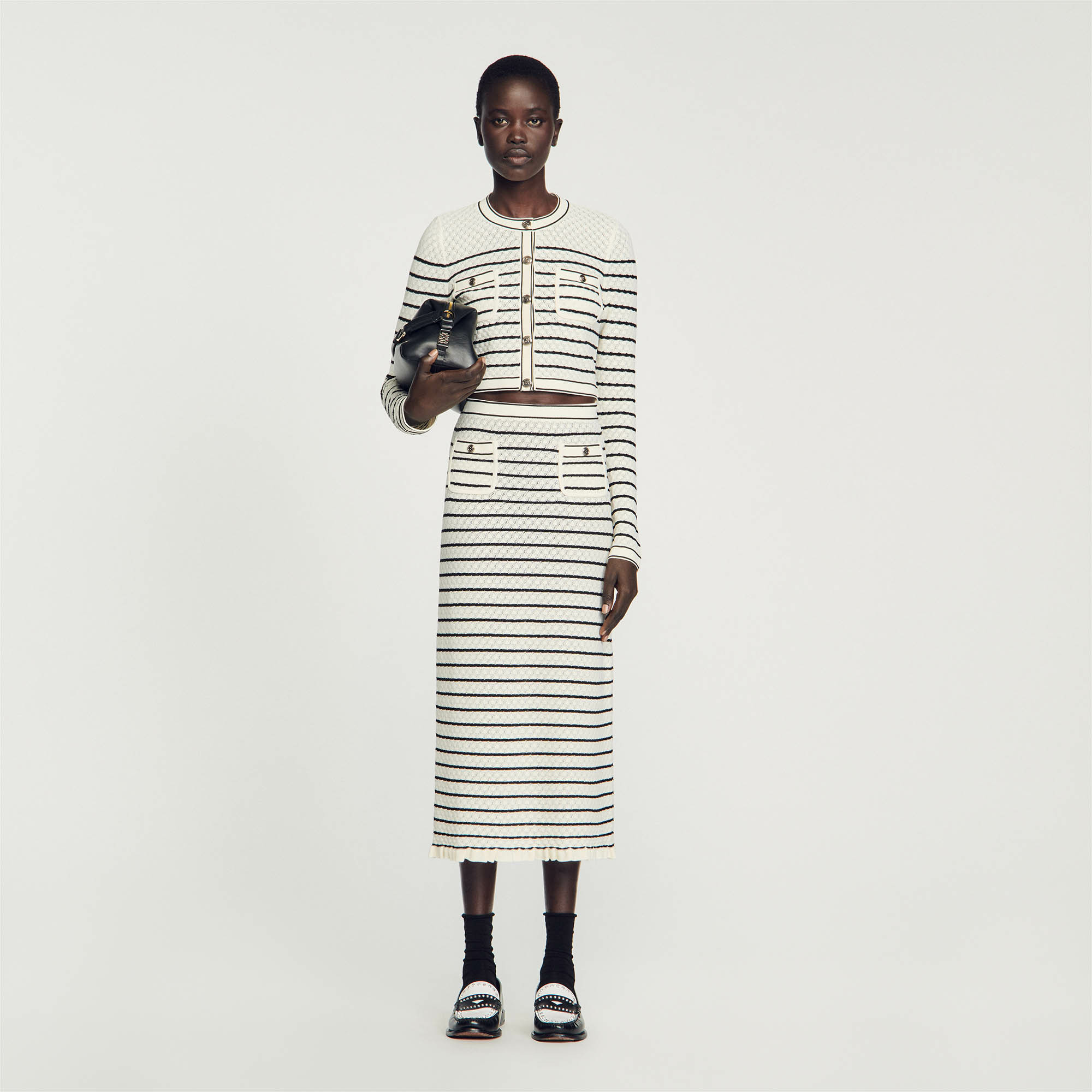 Jupe midi en maille rayée