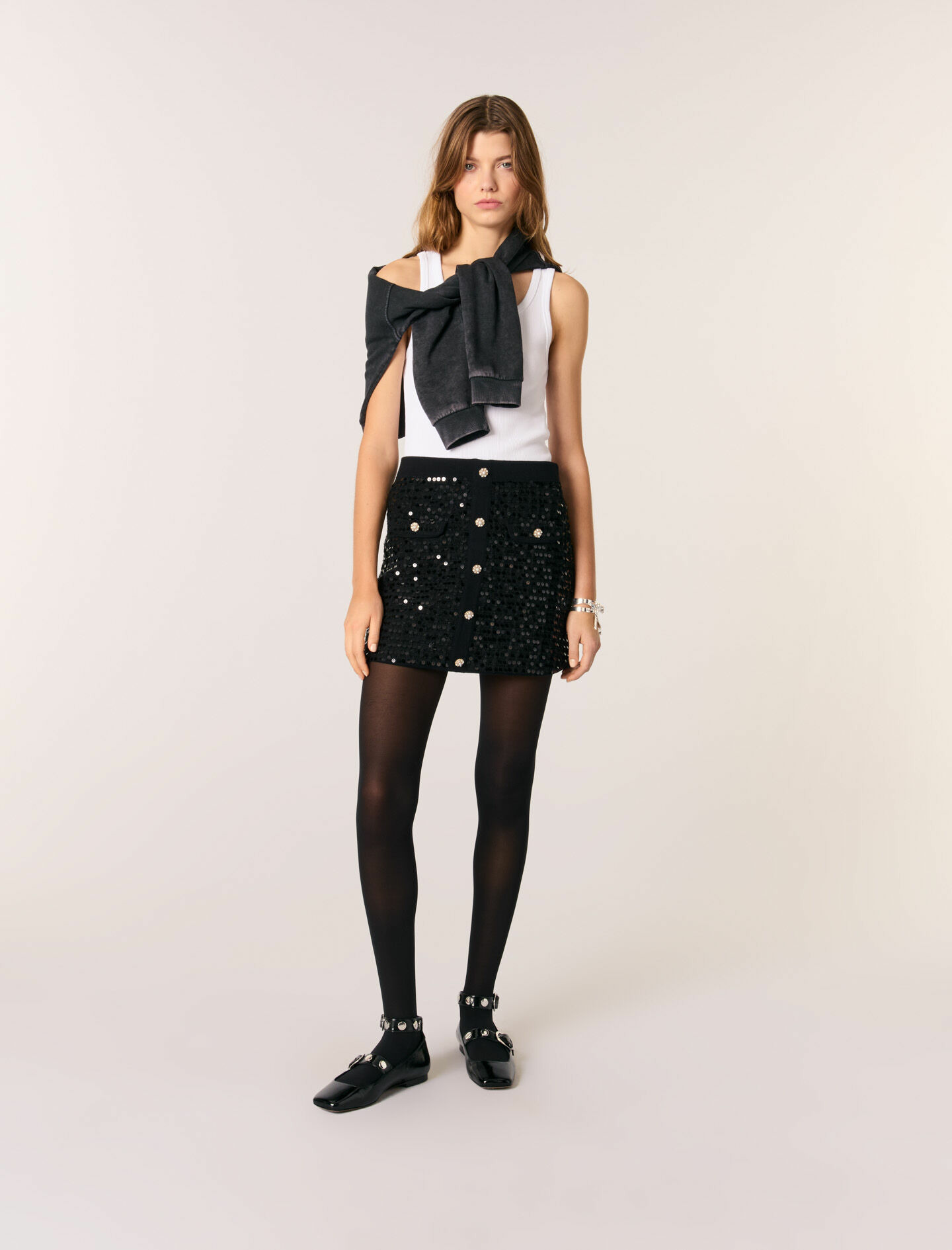 Jupe courte en maille à sequins