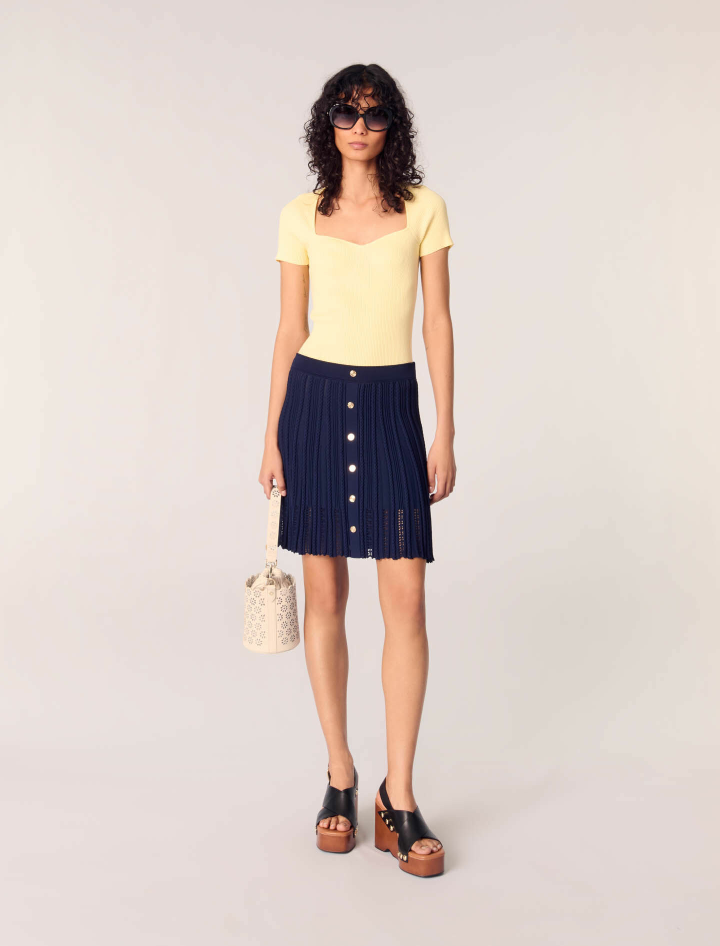 Jupe courte en maille tressée