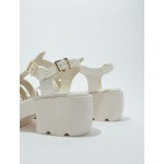 Sandales crantées en cuir
