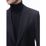 Costume ajusté en laine à plumetis