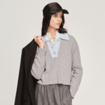 Pull court en maille torsadée