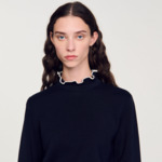 Pull à col volanté