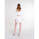 Jupe courte en maille à sequins