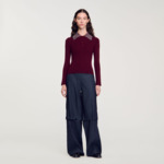 Pull à col orné de pastilles