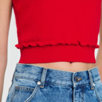 Pull sans manches à volant