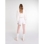Jupe short plissée en tweed