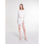 Jupe courte en maille à sequins