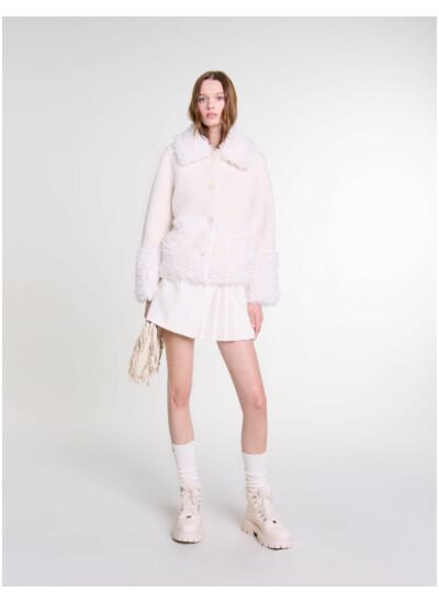 Manteau court fausse fourrure